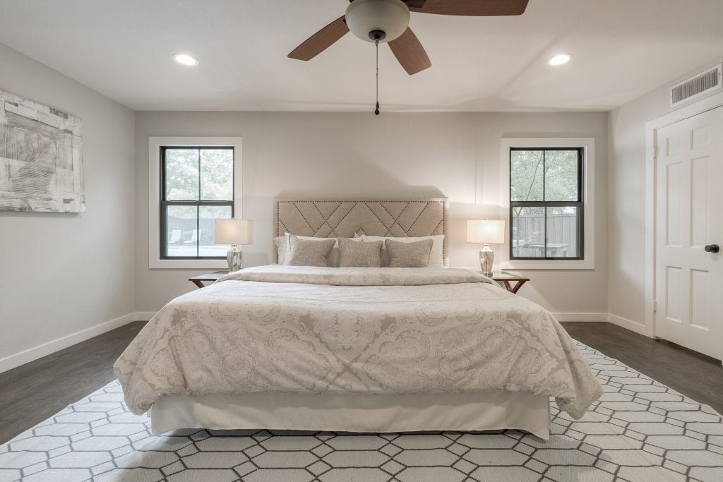 Design-by-Keti-Dallas-Texas-Renovations-Interior-Design-Home-Staging-Luxury-Bedroom-Light-Bedding-Ceiling-Fan-Area-Rug-Windows-Northwood-Hills