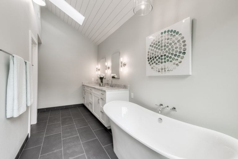 Design-by-Keti-Dallas-Texas-Renovations-Interior-Design-Home-Staging-Luxury-Bathroom-White-Vanity-Mirrors-Sconces-Large-Soaking-Tub-Dark-Flooring-Northwood-Hills