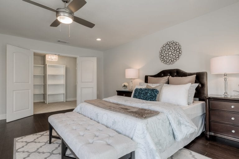 Design-by-Keti-Dallas-Texas-Renovations-Interior-Design-Home-Staging-Luxury-Master-Bedroom-Neutral-Bedding-Area-Rug-Ceiling-Fan-Bench-Dallas