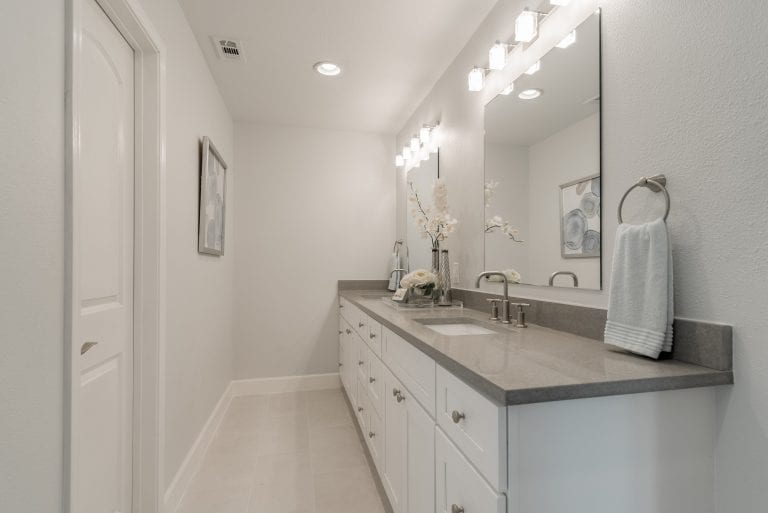 Design-by-Keti-Dallas-Texas-Renovations-Interior-Design-Home-Staging-Luxury-Master-Bathroom-White-Vanity-Gray-Countertops-Double-Sinks-Light-Fixtures-Dallas