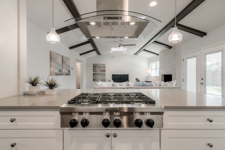 Design-by-Keti-Dallas-Texas-Renovations-Interior-Design-Home-Staging-Luxury-Family-Room-View-From-Kitchen-Stainless-Steel-Range-Vent-Hood-Ceiling-Beam-Detail-Dallas