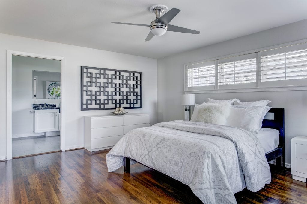 Design-by-Keti-Dallas-Texas-Renovations-Interior-Design-Home-Staging-Luxury-Bedroom-Light-Bedding-Artwork-Ceiling-Fan-High-Windows-Lakewood