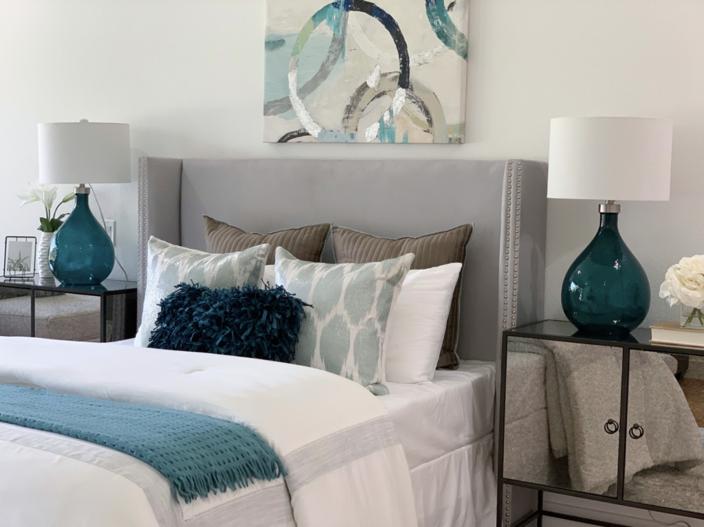 design by keti master bedroom staging blue white navy art lamp upholstered bedframe dallas cost home staging