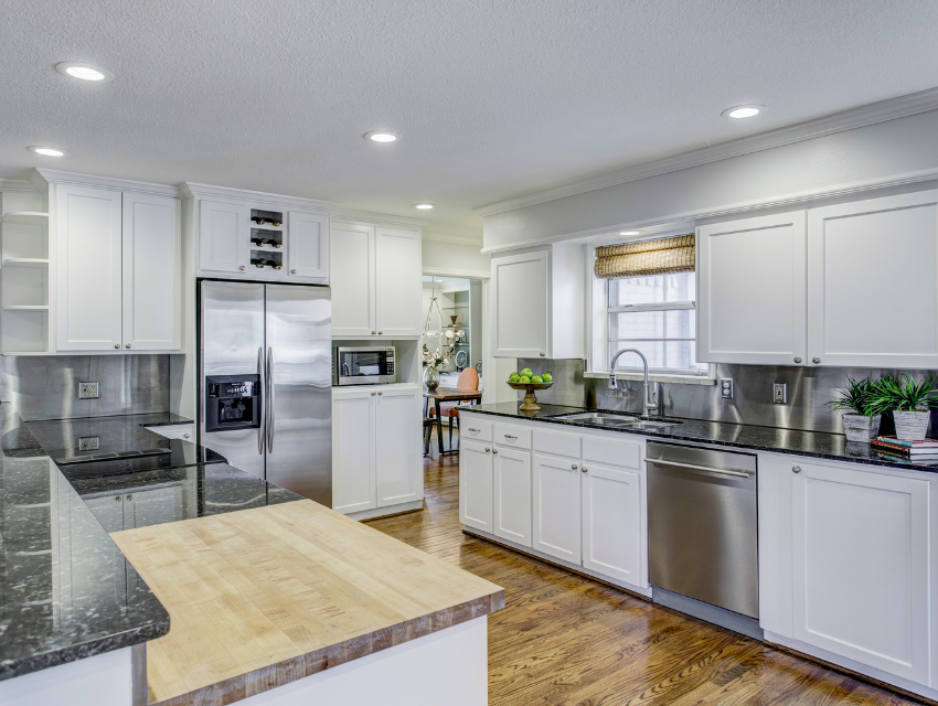 design by keti dallas home staging roi case study butcher block and travertine backsplash