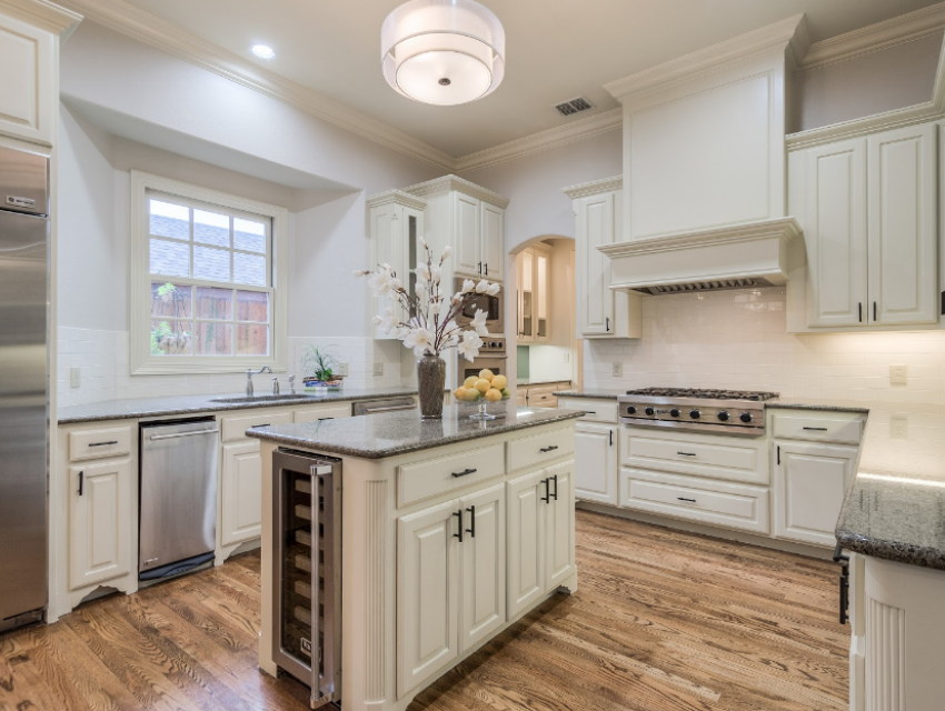 Renovated Dallas home kitchen white cabinets wine fridge updated traditional sophisticated budget-friendly kitchen makeover