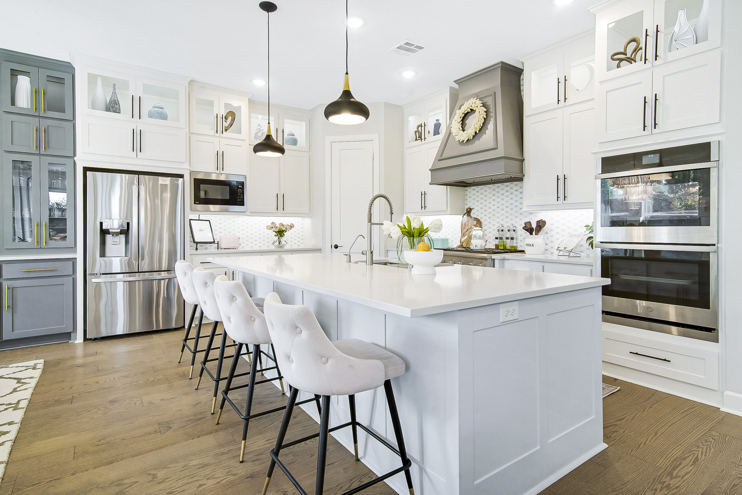 Custom home interior design in Dallas featuring an open-concept kitchen, dining and living space
